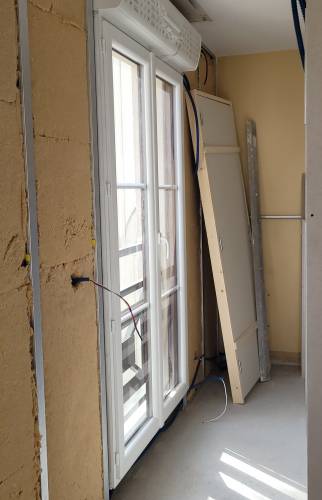 Poses de fenêtres avec volet électrique