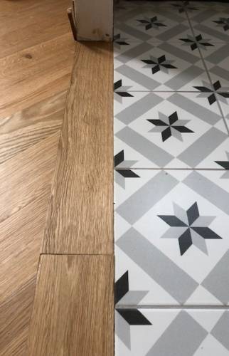 Finition du parquet massif à Clichy