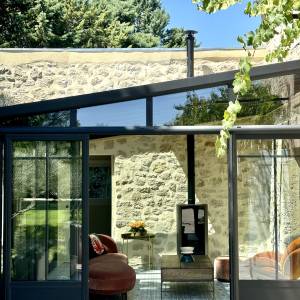 Aménagement d'une salle de sport dans une véranda