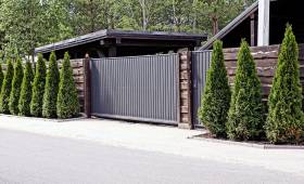 Création d’un mur de clôture, pose d’un portail en aluminium et d’automatisme