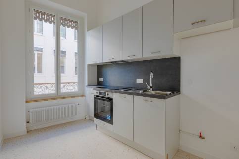 Lyon (Plateau de la Croix Rousse) : isolation des murs pour améliorer le DPE d'un appartement destiné à la location