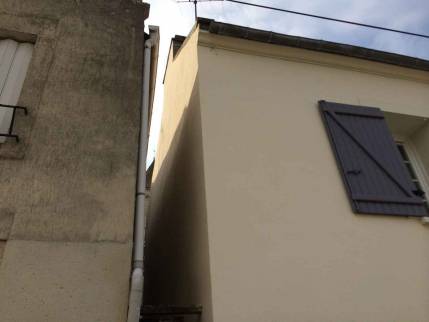 Ravalement des façades d'une maison dans le Calvados