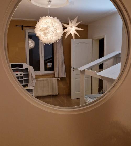 Verrière ronde dans chambre d'enfant à Saint Louis