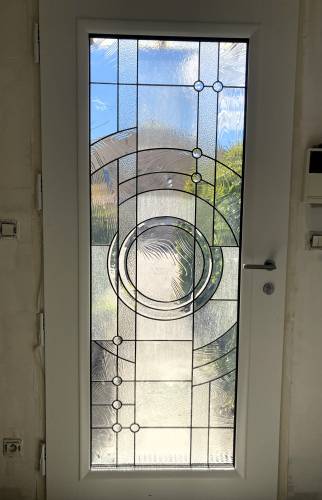 Rénovation d'une porte d'entrée, dans un style Art Déco, maison située à Ecully (69130) : détail intérieur, serrure automatique SA2P2C