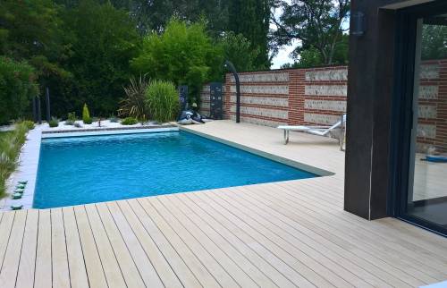 Piscine rectangulaire semi enterrée avec terrasse composite - Cergy - 95000 -