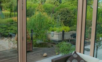 Rénovation de maison en meulière avec extension verre et bois à Pournoy-la-Grasse 57 420