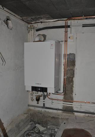 Chaudière à gaz haute performance posée en rénovation énergétique de maison - Servon 77170