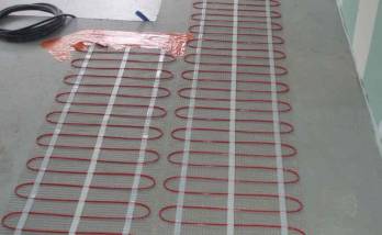 Installation d'un chauffage au sol dans une salle de bain SPA à Seillac