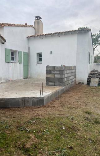 Edification de l'extension sur une terrasse inutilisée