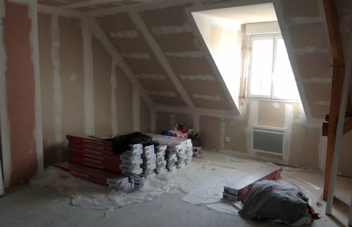 Isolation des combles proche de la fenêtre