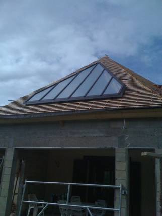 Pose de fenêtre triangulaire