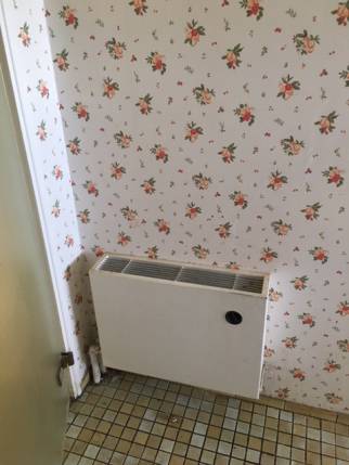 Travaux de remplacement de chauffage - ancien radiateur dans la cuisine - Nantes 44