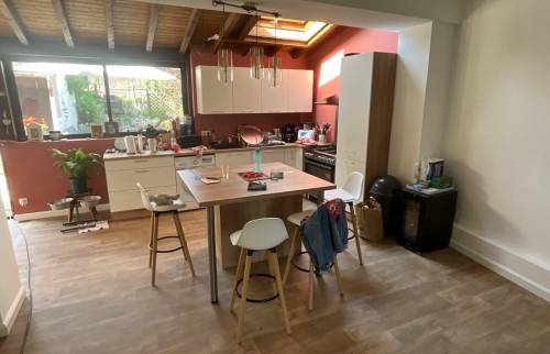 Rénovation à Voiron : ouverture entre cuisine et salon pour une grande pièce de vie