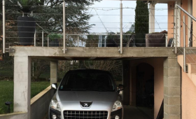 terasse en béton ciré vue de face carport 