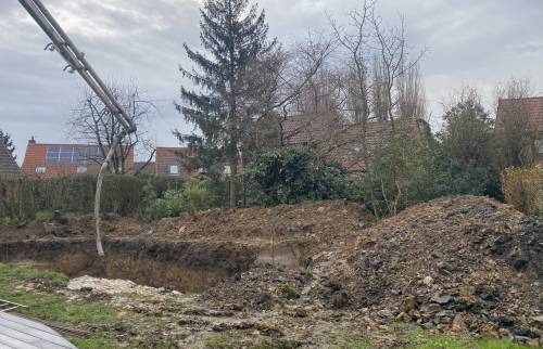 Coulage de la dalle béton à l'aide d'un bras télescopique 