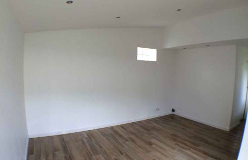 Salon avec carrelage imitation parquet Tendances Sols - Nantes