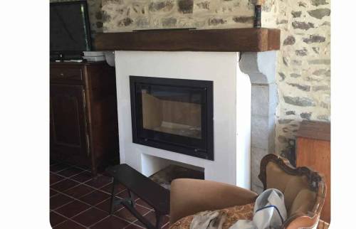 Insert posé dans une ancienne cheminée à Hauteville-Sur-Mer (50590).