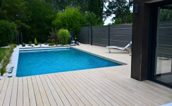 Aménagement de jardin avec création de plage de piscine et pose d'une clôture en alu - La Plaine sur mer 44770
