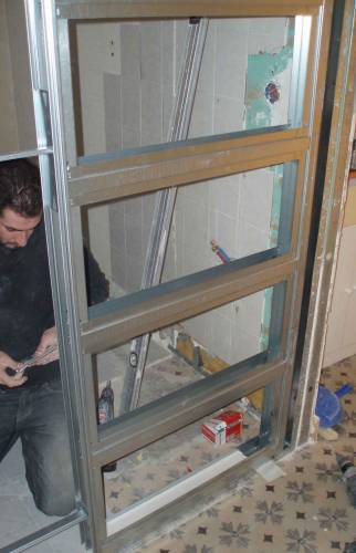 Pose de la porte à galandage