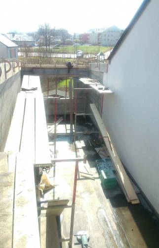 Elévation murs parpaings  sur ancien toit plat - Orvault