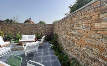 mur en parpaing avec parement pierre à St Gatien des Bois