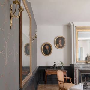 Murs en pisé rénovés dans une maison ancienne à Oullins