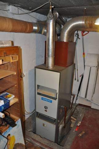 Ancienne chaudière à gaz avant travaux de rénovation énergétique - Servon 77170