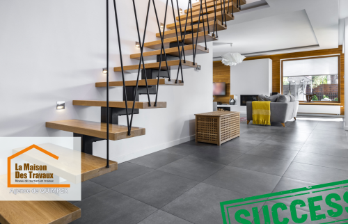 Un escalier moderne suspendu en bois et métal illumine un espace de vie contemporain, combinant design épuré et fonctionnalité. 🌟