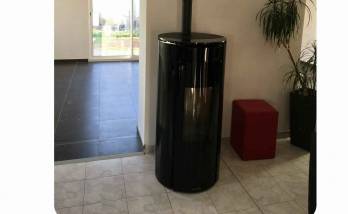 Pose d'un poêle à bois à La Lucerne d'Outremer (50320).