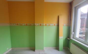Avant travaux : ancienne cheminée dans une chambre à Harnes.
