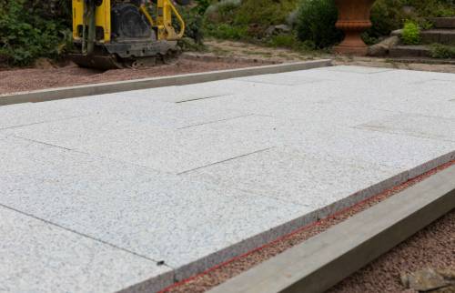 Création d'une terrasse en dalles gravillonnées à St Pair Sur Mer (50380)