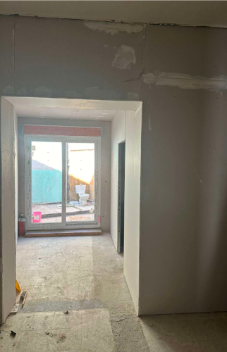 Redistribution de l'espace avec modification de l'accès au jardin 