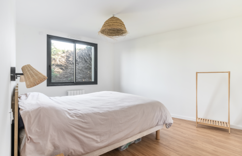 Extension de maison avec ossature et bardage bois à Vertou