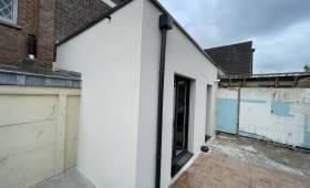 Agrandissement maison terminée finition enduit lissé