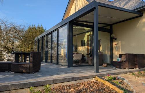 Aperçu de la véranda et de la pergola - Extension et aménagement extérieur