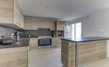 Rénovation complète d’une maison avec aménagement d’un garage transformé en séjour cuisine à Neuville sur Saône