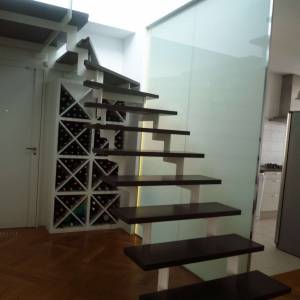 Aménagement intérieur Paris 16e - Escalier accédant à la terrasse du 8e étage