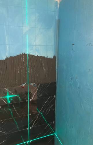 Prise de mesure pour pose de carrelage de douche à Clermont-Ferrand