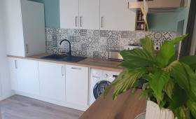 Cuisine esthétique avec chaudière dissimulée 