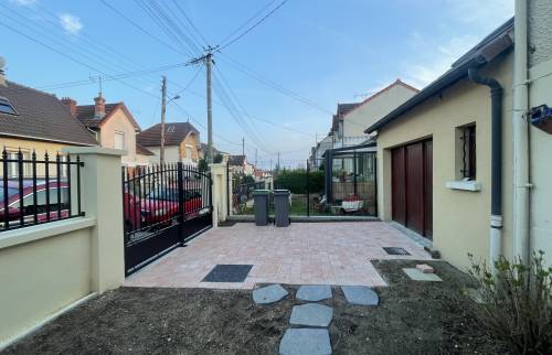 Rénovation de clôture et de revêtement de sol extérieur à Massy
