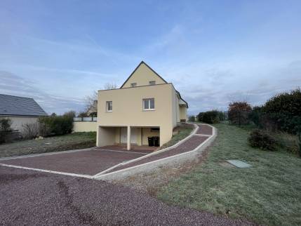 Maison après travaux avec aménagements des allées de jardin (Andrieu 14250)