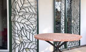 Réalisation de grilles de défense sur-mesure en métal ajouré appartement en rez-de-jardin Lyon 9ème arrondissement Vaise