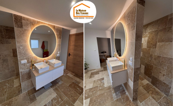 carrelage effet pierre salle de bain, robinetterie dorée salle de bain, salle de bain contemporaine Gex, rénovation intérieure Pays de Gex, artisans salle de bain