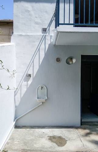 Traitement des façades avant pose du nouveau auvent