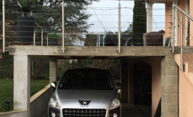 terasse en béton ciré vue de face carport 