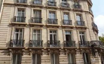 Ravaler la façade d'un immeuble à Paris étoile