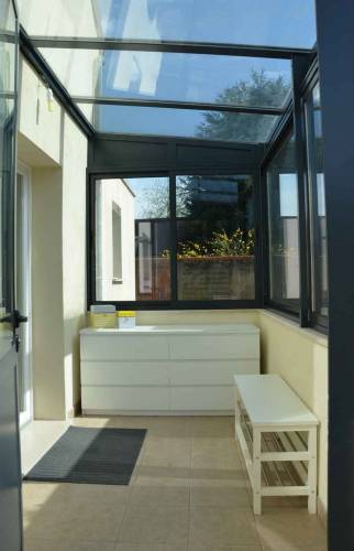 Véranda sur allège maçonnée