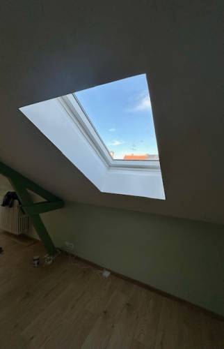 Aménagement de combles pour une maison à Troyes fenêtre