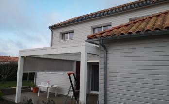 Installation d'une pergola bioclimatique au Bignon