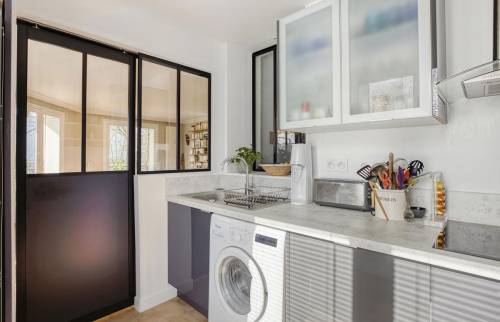 Cuisine rénovée, la porte verrière